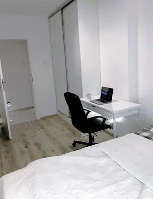 Łóżko lub łóżka w pokoju w obiekcie Icon Apartments Centrum 68
