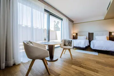 Łóżko lub łóżka w pokoju w obiekcie AC Hotel by Marriott Wroclaw