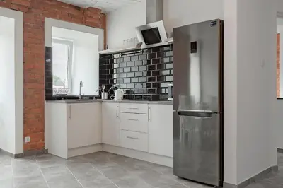 Kuchnia lub aneks kuchenny w obiekcie Apartament w starym browarze 2