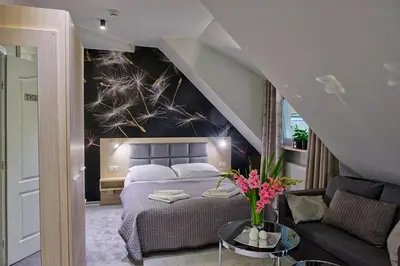 Łóżko lub łóżka w pokoju w obiekcie Hotel Podjadek