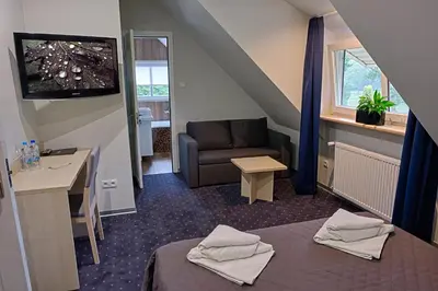 Telewizja i/lub zestaw kina domowego w obiekcie Hotel Podjadek