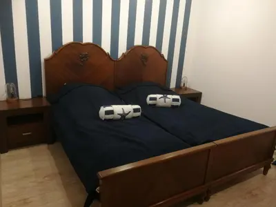 Łóżko lub łóżka w pokoju w obiekcie Apartamenty w Gorach Stolowych