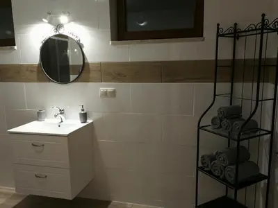 Łazienka w obiekcie Apartamenty w Gorach Stolowych