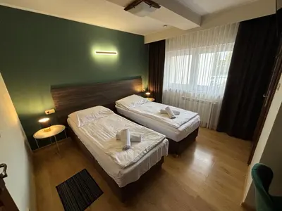 Łóżko lub łóżka w pokoju w obiekcie Boho Hotel i Restauracja