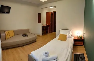 Łóżko lub łóżka w pokoju w obiekcie Boho Hotel i Restauracja