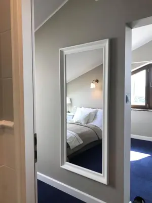 Łóżko lub łóżka w pokoju w obiekcie Szafirowy Dwór Hotel & Restauracja