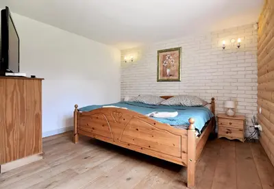 Łóżko lub łóżka w pokoju w obiekcie Królikówka