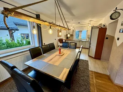 Część wypoczynkowa w obiekcie Domek Monte Black z jacuzzi i sauną fińską