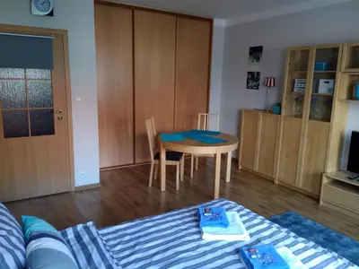 Łóżko lub łóżka w pokoju w obiekcie Traugutta apartment