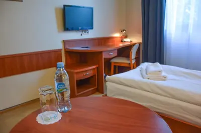 Łóżko lub łóżka w pokoju w obiekcie Hotel Neo