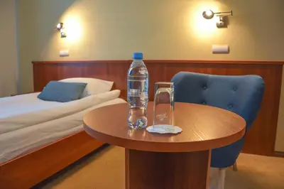 Łóżko lub łóżka w pokoju w obiekcie Hotel Neo