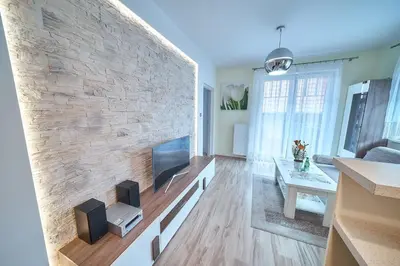 Telewizja i/lub zestaw kina domowego w obiekcie Apartament Willa Ogrodowa 18