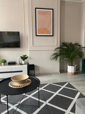 Telewizja i/lub zestaw kina domowego w obiekcie Apartament BellaPola