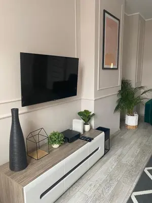 Telewizja i/lub zestaw kina domowego w obiekcie Apartament BellaPola