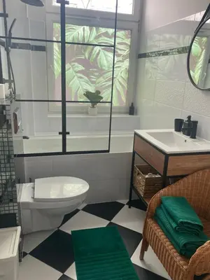 Łazienka w obiekcie Apartament BellaPola