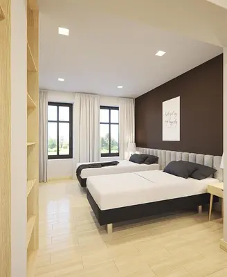 Łóżko lub łóżka w pokoju w obiekcie SleepZone Apartments