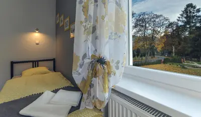 Łóżko lub łóżka w pokoju w obiekcie Apartament Grosik