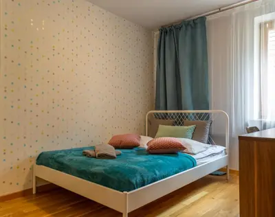 Łóżko lub łóżka w pokoju w obiekcie Nozownicza Street Apartment