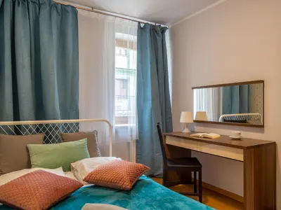 Łóżko lub łóżka w pokoju w obiekcie Nozownicza Street Apartment