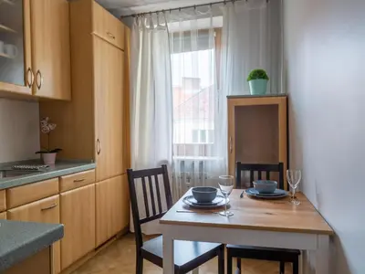 Kuchnia lub aneks kuchenny w obiekcie Nozownicza Street Apartment