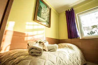 Łóżko lub łóżka w pokoju w obiekcie Wanda