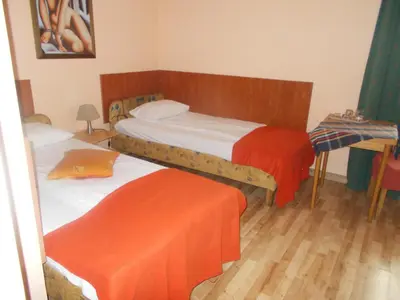 Łóżko lub łóżka w pokoju w obiekcie Motel Rezydent