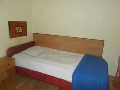 Łóżko lub łóżka w pokoju w obiekcie Motel Rezydent