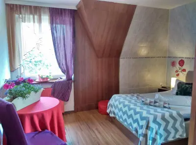 Łóżko lub łóżka w pokoju w obiekcie Motel Rezydent