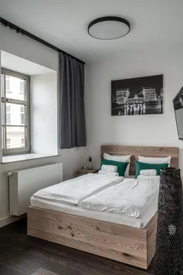 Łóżko lub łóżka w pokoju w obiekcie RentPlanet - Apartamenty Stare Miasto