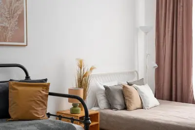 Łóżko lub łóżka w pokoju w obiekcie A.S. Home Świdnicka Street