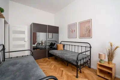Łóżko lub łóżka w pokoju w obiekcie A.S. Home Świdnicka Street