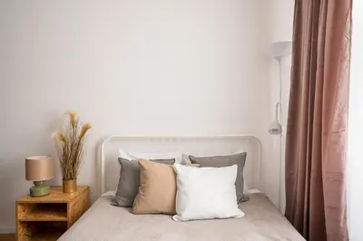 Łóżko lub łóżka w pokoju w obiekcie A.S. Home Świdnicka Street