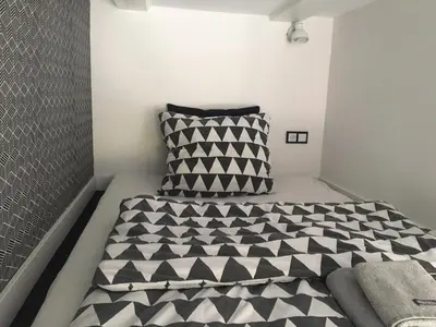 Łóżko lub łóżka w pokoju w obiekcie Apartament Na Wyspie