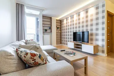 Telewizja i/lub zestaw kina domowego w obiekcie WrocApartments StarCenter - Parking Free
