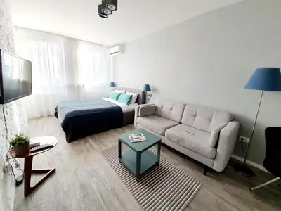 Łóżko lub łóżka w pokoju w obiekcie WrocApartments StarCenter - Parking Free