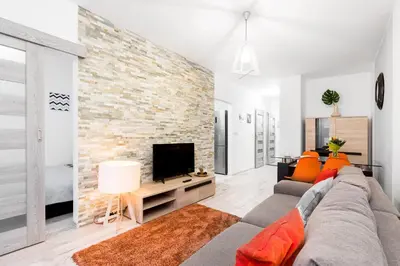 Telewizja i/lub zestaw kina domowego w obiekcie WrocApartments StarCenter - Parking Free