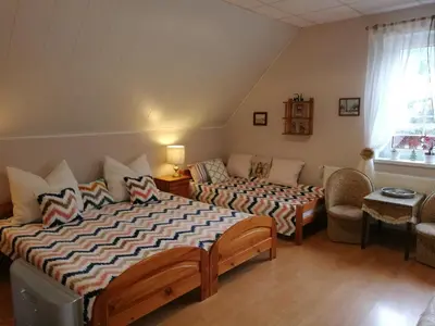 Łóżko lub łóżka w pokoju w obiekcie Domek Górski Strumień