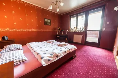 Łóżko lub łóżka w pokoju w obiekcie Apartament Eva