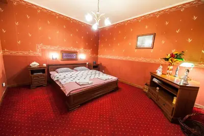 Łóżko lub łóżka w pokoju w obiekcie Apartament Eva