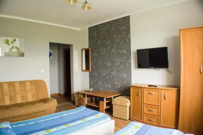 Łóżko lub łóżka w pokoju w obiekcie Ośrodek Pegaz