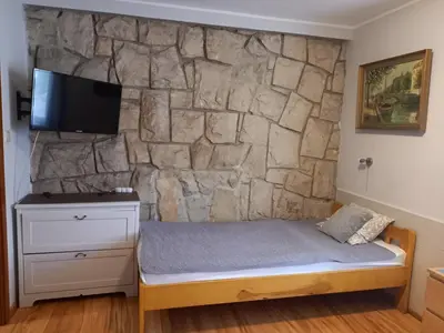 Łóżko lub łóżka w pokoju w obiekcie Villa Laura