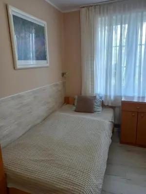 Łóżko lub łóżka w pokoju w obiekcie Villa Laura
