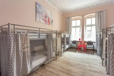 Łóżko lub łóżka w pokoju w obiekcie Babel Hostel, Dworzec PKP, Rynek