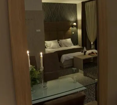 Łóżko lub łóżka w pokoju w obiekcie Hotel Vis A Vis