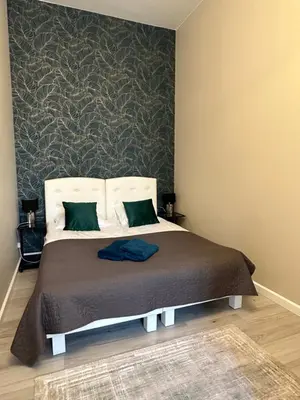 Łóżko lub łóżka w pokoju w obiekcie Apartament Wroclawia