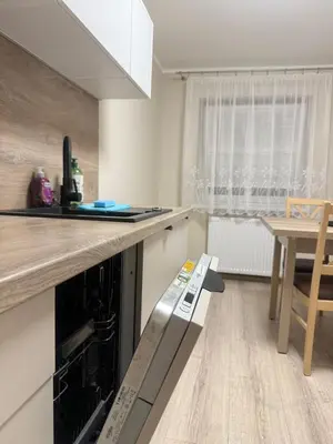 Kuchnia lub aneks kuchenny w obiekcie Apartamenty Słoneczne Wzgórze