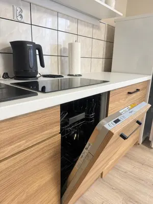 Kuchnia lub aneks kuchenny w obiekcie Apartamenty Słoneczne Wzgórze
