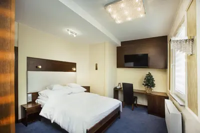 Łóżko lub łóżka w pokoju w obiekcie Hotel Inter