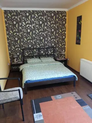 Łóżko lub łóżka w pokoju w obiekcie Pod Klonem