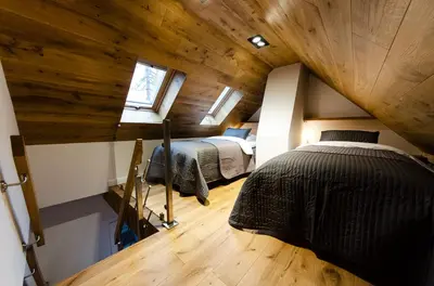 Łóżko lub łóżka w pokoju w obiekcie Apartament Dębowy
